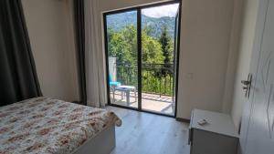 Voodi või voodid majutusasutuse Hotel Palm Gonio toas