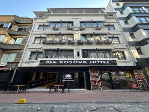 a building on a street with a hotel at Kosova Hotel in Istanbul +21 photos