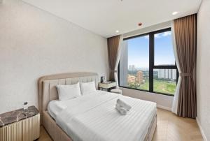 Ένα ή περισσότερα κρεβάτια σε δωμάτιο στο Smile Home - Lumiere Luxury stay view & infinity pool +83 φωτογραφίες
