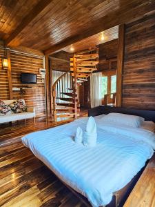Postel nebo postele na pokoji v ubytování My log home resort