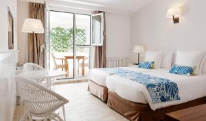 Postel nebo postele na pokoji v ubytování Hotel Playa Sol