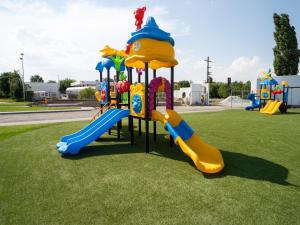 a playground with a slide and a slideintend at Kift Garden Events in Medgidia