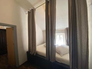 Postel nebo postele na pokoji v ubytování Vakantiehuis 'Beim Mulles'