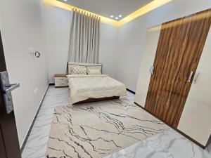Giường trong phòng chung tại فيلا امين