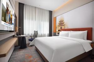 Letto o letti in una camera di Hampton by Hilton Nanjing Xianlin University Town