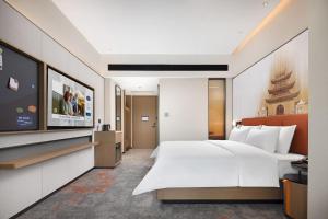 Letto o letti in una camera di Hampton by Hilton Nanjing Xianlin University Town