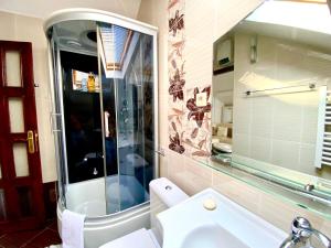 a bathroom with a sink and a mirror at House with a pier in Donji Morinj +70 photos