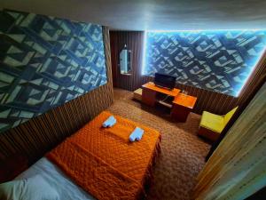 Postel nebo postele na pokoji v ubytování Korona Hotel