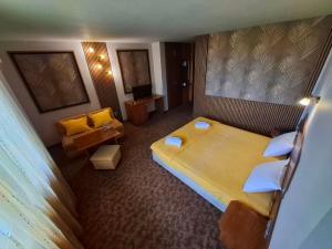 Postel nebo postele na pokoji v ubytování Korona Hotel