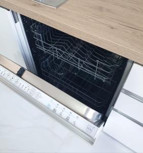 an oven with its door open with a rack inside at La Perla dell'Adriatico in Termoli
