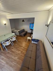 Ruang duduk di VILLAGE SINTRA gh