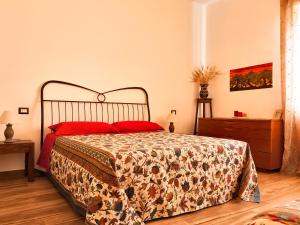 Postel nebo postele na pokoji v ubytování B&B Casa Rossella