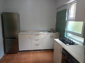 Kuchyň nebo kuchyňský kout v ubytování Palma Hostel + 7 fotografií