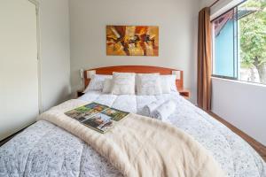 Cama ou camas em um quarto em Imperial Inn Hospedaje Turistico