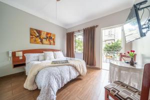 Cama ou camas em um quarto em Imperial Inn Hospedaje Turistico