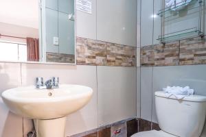 Um banheiro em Imperial Inn Hospedaje Turistico