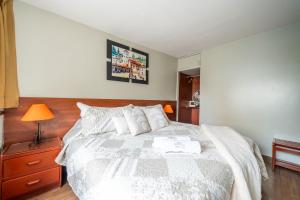 Cama ou camas em um quarto em Imperial Inn Hospedaje Turistico