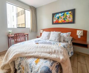 Cama ou camas em um quarto em Imperial Inn Hospedaje Turistico