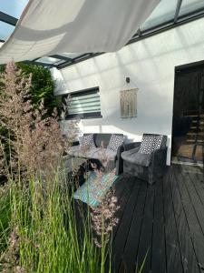 Fotografia z galérie ubytovania Karwia Plaza - Apartments - Domki z jacuzzi i sauną v destinácii Karwia