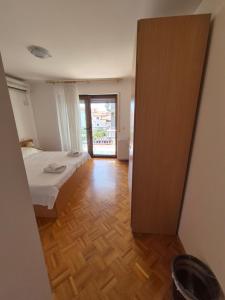 Katil atau katil-katil dalam bilik di Apartments and Rooms Mamić