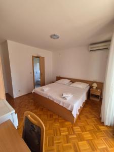 Katil atau katil-katil dalam bilik di Apartments and Rooms Mamić