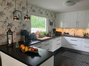 Cucina o angolo cottura di Mysigt rum i trevligt hus