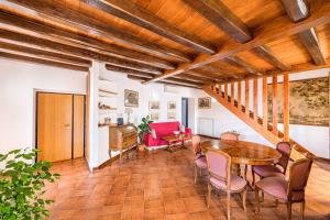 Khu vực ghế ngồi tại BB Il Re Alla Reginella Guest House