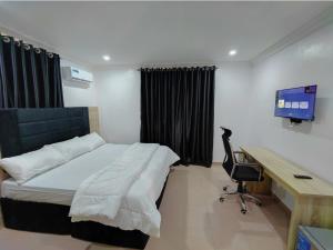 Postel nebo postele na pokoji v ubytování Lekki City View Apartment