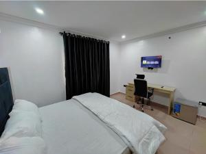 Posteľ alebo postele v izbe v ubytovaní Lekki City View Apartment