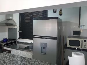 Kuchyň nebo kuchyňský kout v ubytování Acogedor departamento estilo boho