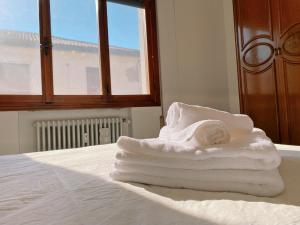 Voodi või voodid majutusasutuse Venice Apollo toas