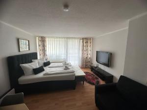 Postel nebo postele na pokoji v ubytování Wohnung in Sankt Englmar Nr 512