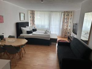 Postel nebo postele na pokoji v ubytování Wohnung in Sankt Englmar Nr 512