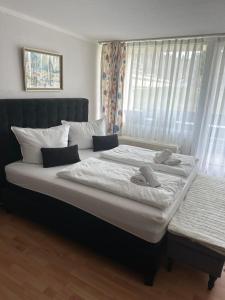 Postel nebo postele na pokoji v ubytování Wohnung in Sankt Englmar Nr 512
