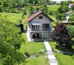 an aerial view of a house on a hill at Kuća za odmor VB-IDRO in Tuhelj