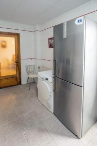 Kuchyň nebo kuchyňský kout v ubytování L'Hostalet GuestHouse