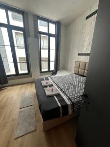 Postel nebo postele na pokoji v ubytování Stay in Antwerp City