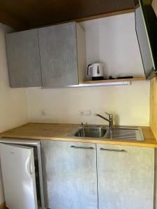 Kuchyň nebo kuchyňský kout v ubytování Haus Waldegg 84