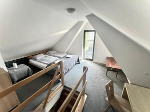 Posteľ alebo postele v izbe v ubytovaní Chata Apart