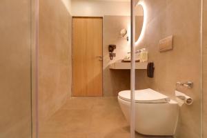 A bathroom at Lemon Tree Resort, Somnath