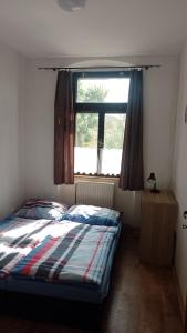 Postel nebo postele na pokoji v ubytování Ubytování Ždírec - Apartmán 2