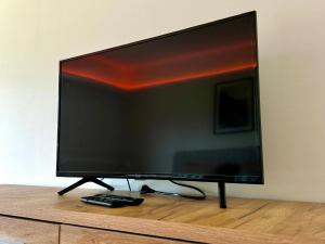 TV a/nebo společenská místnost v ubytování Ferienwohnung Conny