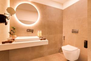 A bathroom at Lemon Tree Resort, Somnath