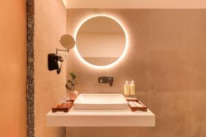 A bathroom at Lemon Tree Resort, Somnath
