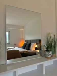 Postel nebo postele na pokoji v ubytování Ferienwohnung Conny