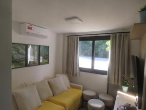 Χώρος καθιστικού στο Vila encanto