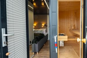 En eller flere senge i et værelse på Houseboat EnergyApart