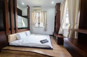 Postel nebo postele na pokoji v ubytování Bukit Mertajam Big Bungalow 15pax with BBQ KTV Snooker