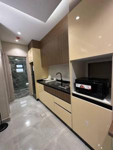 Kuchyň nebo kuchyňský kout v ubytování Chic Apartments For Rent ave1-4 + 9 fotografií