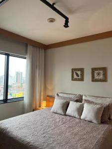 Кровать или кровати в номере Flat área nobre Tatuapé +22 фотографии